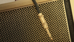guitar cable on amp